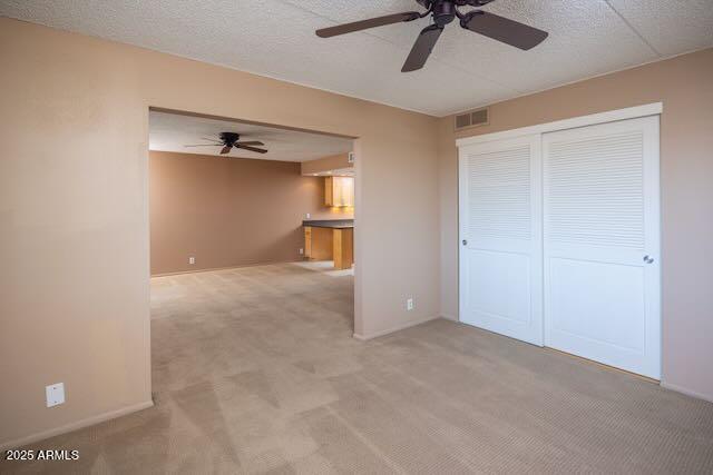 7830 East Camelback Road, Unit 708 Scottsdale, AZ 85251 - Photo 7 of 21 a view of a livingroom with a ceiling fan