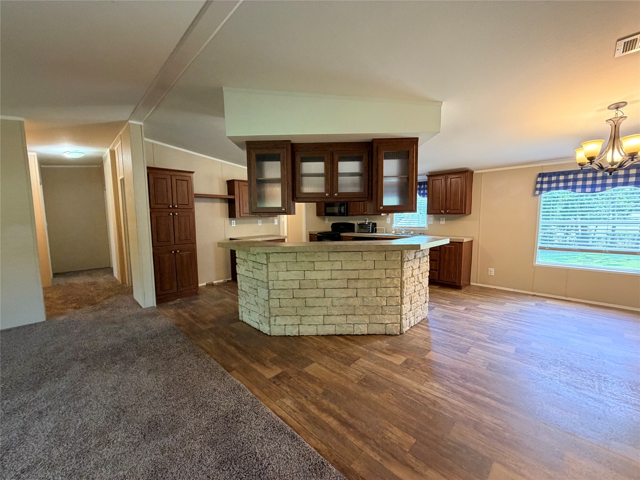 263 Camden Road Chester, TX 75936 - Photo 13 of 49 a living room with stainless steel appliances kitchen island hardwood floor and a large window
