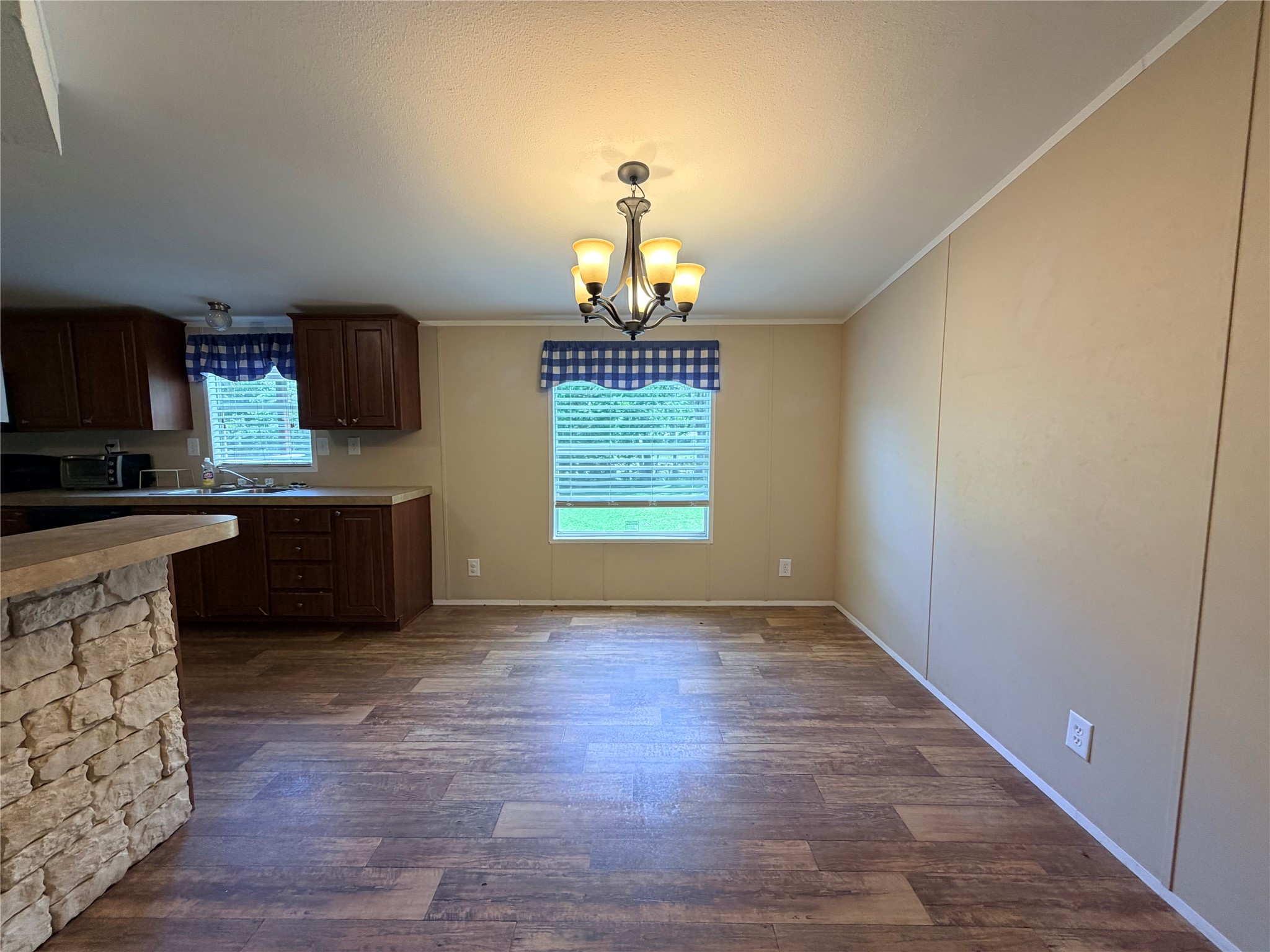 263 Camden Road Chester, TX 75936 - Photo 15 of 49 a view of a kitchen with microwave and windows
