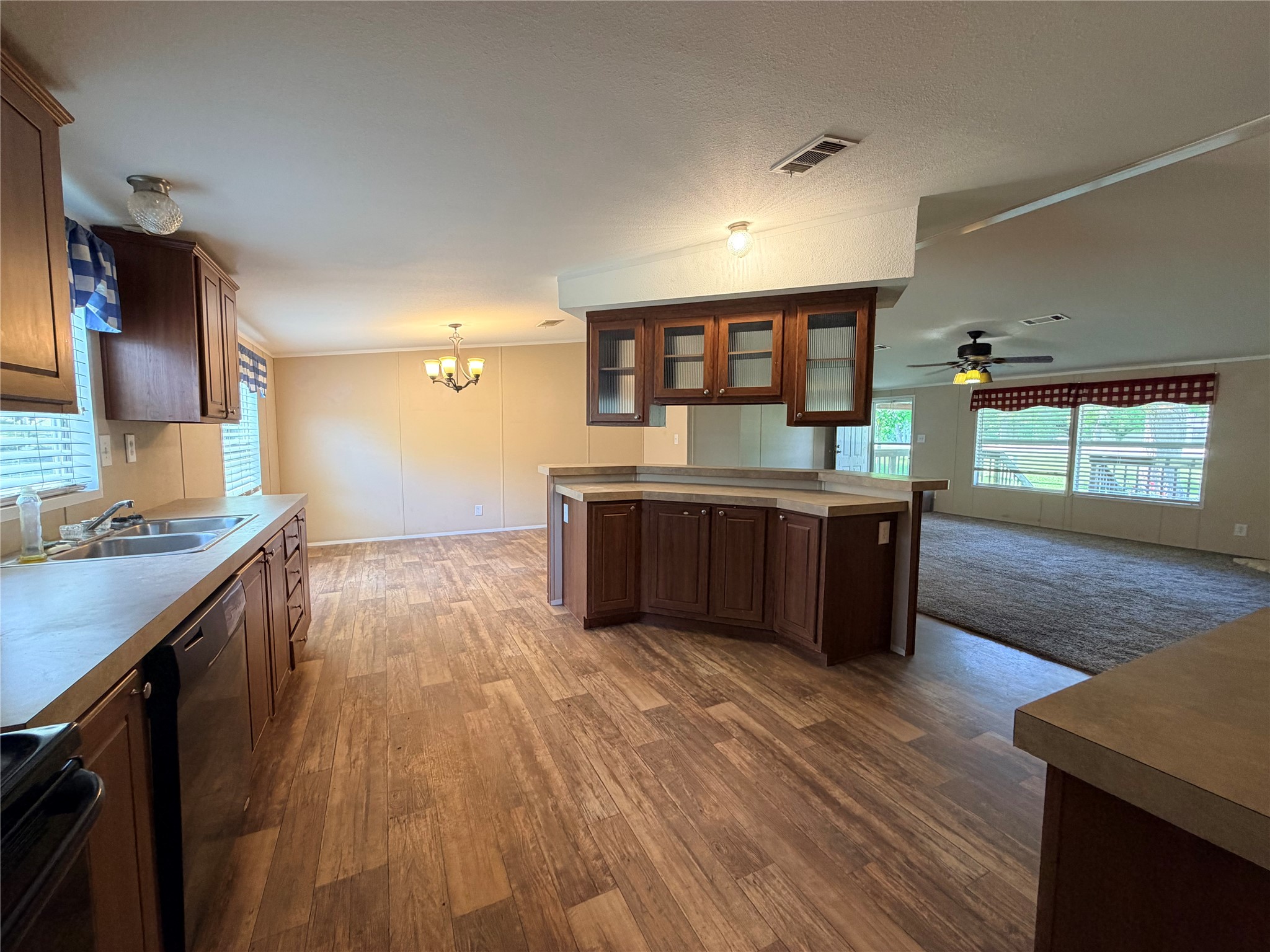 263 Camden Road Chester, TX 75936 - Photo 18 of 49 a large kitchen with stainless steel appliances granite countertop a large counter top and sink