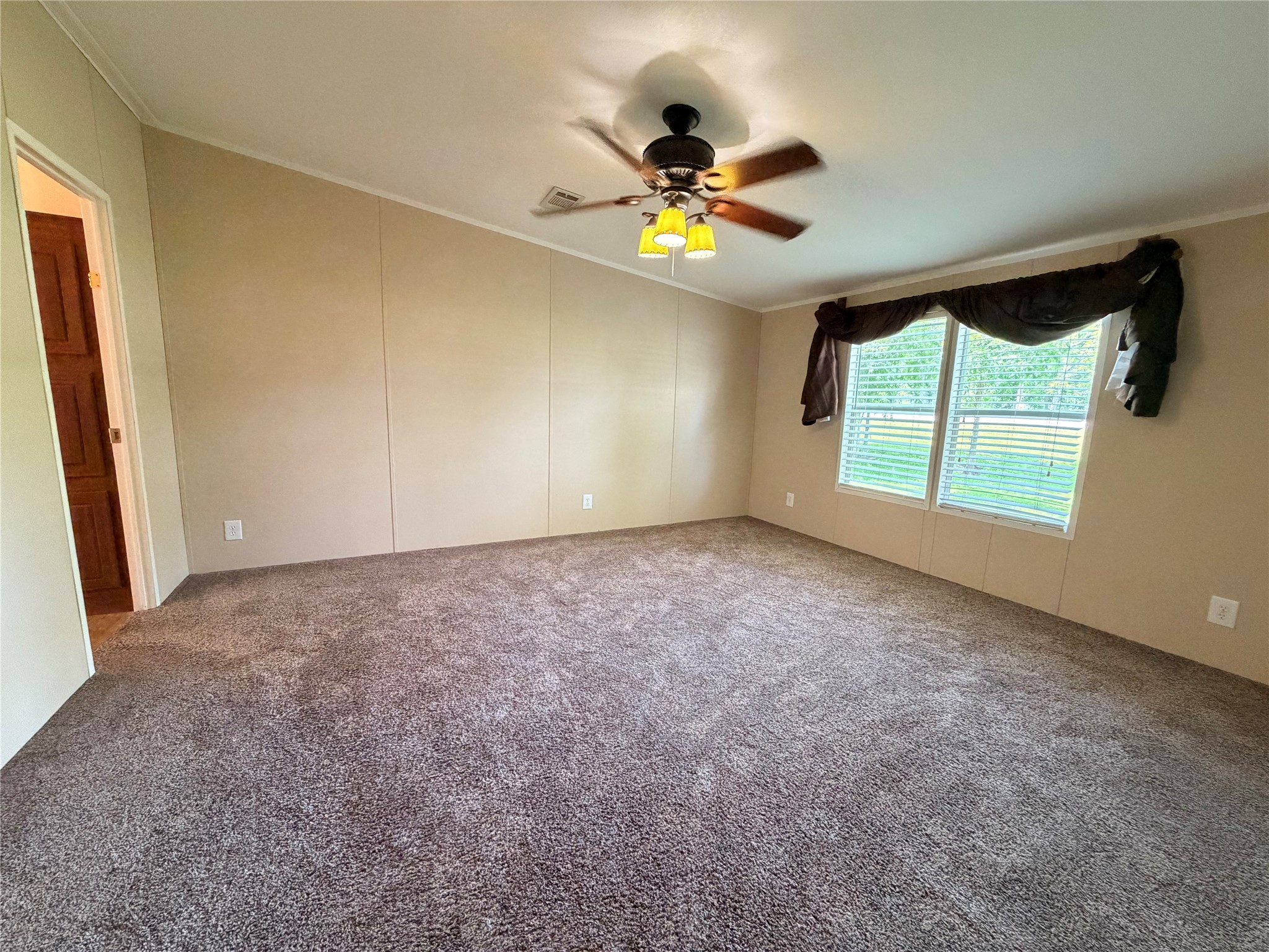 263 Camden Road Chester, TX 75936 - Photo 23 of 49 a view of an empty room with a window