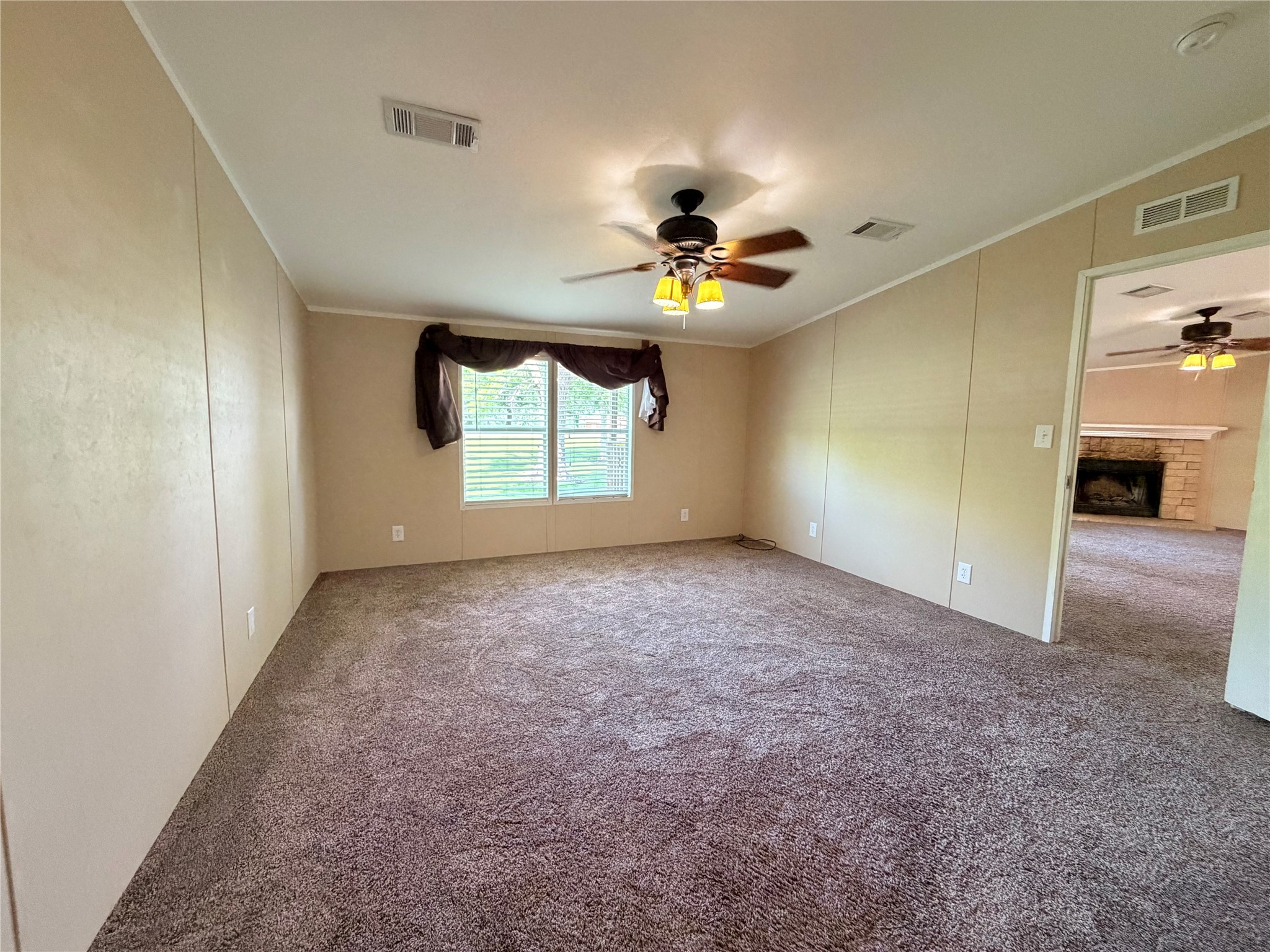 263 Camden Road Chester, TX 75936 - Photo 24 of 49 a view of an empty room with a window