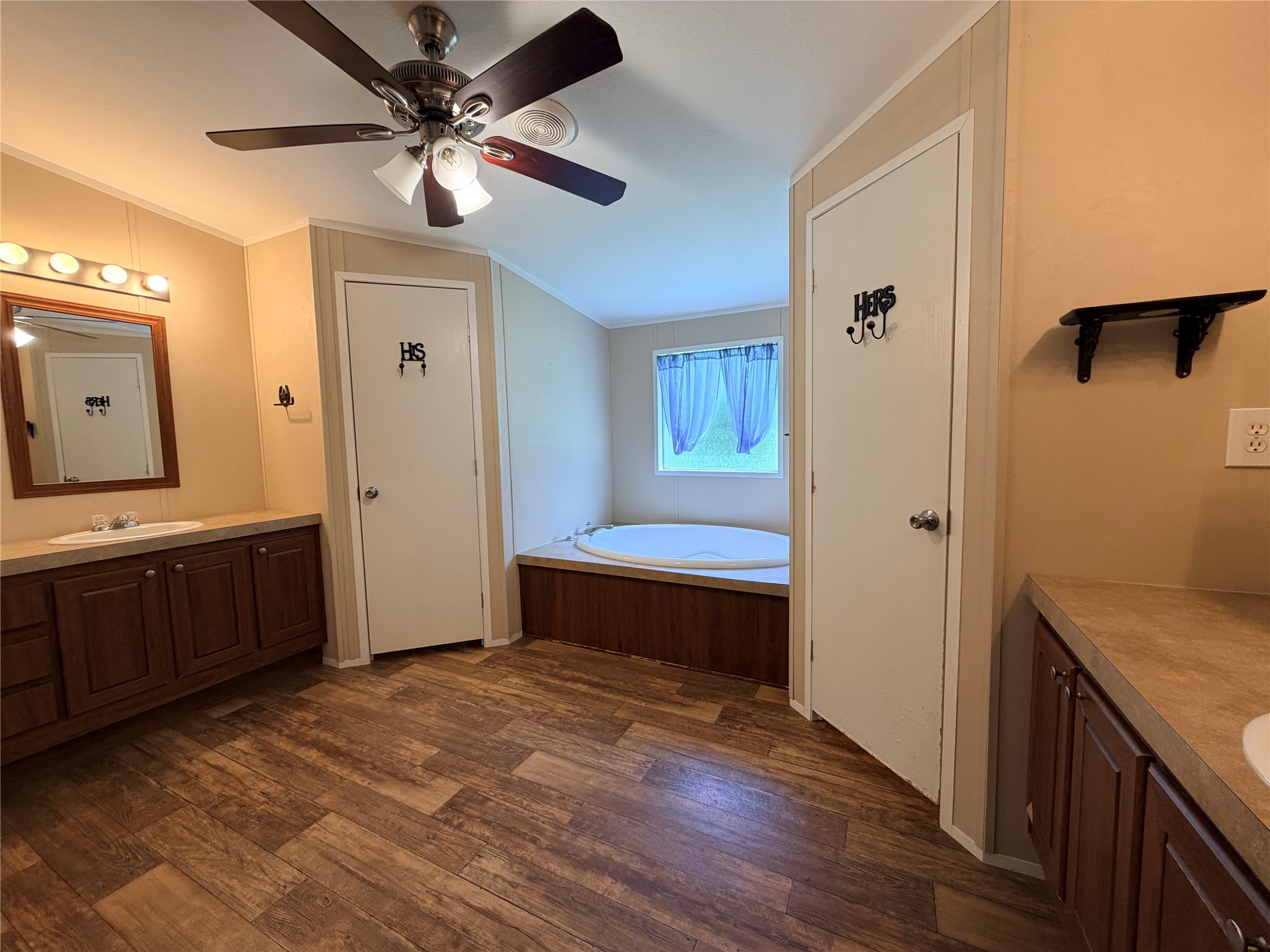 263 Camden Road Chester, TX 75936 - Photo 25 of 49 a view of an empty room with window and wooden floor