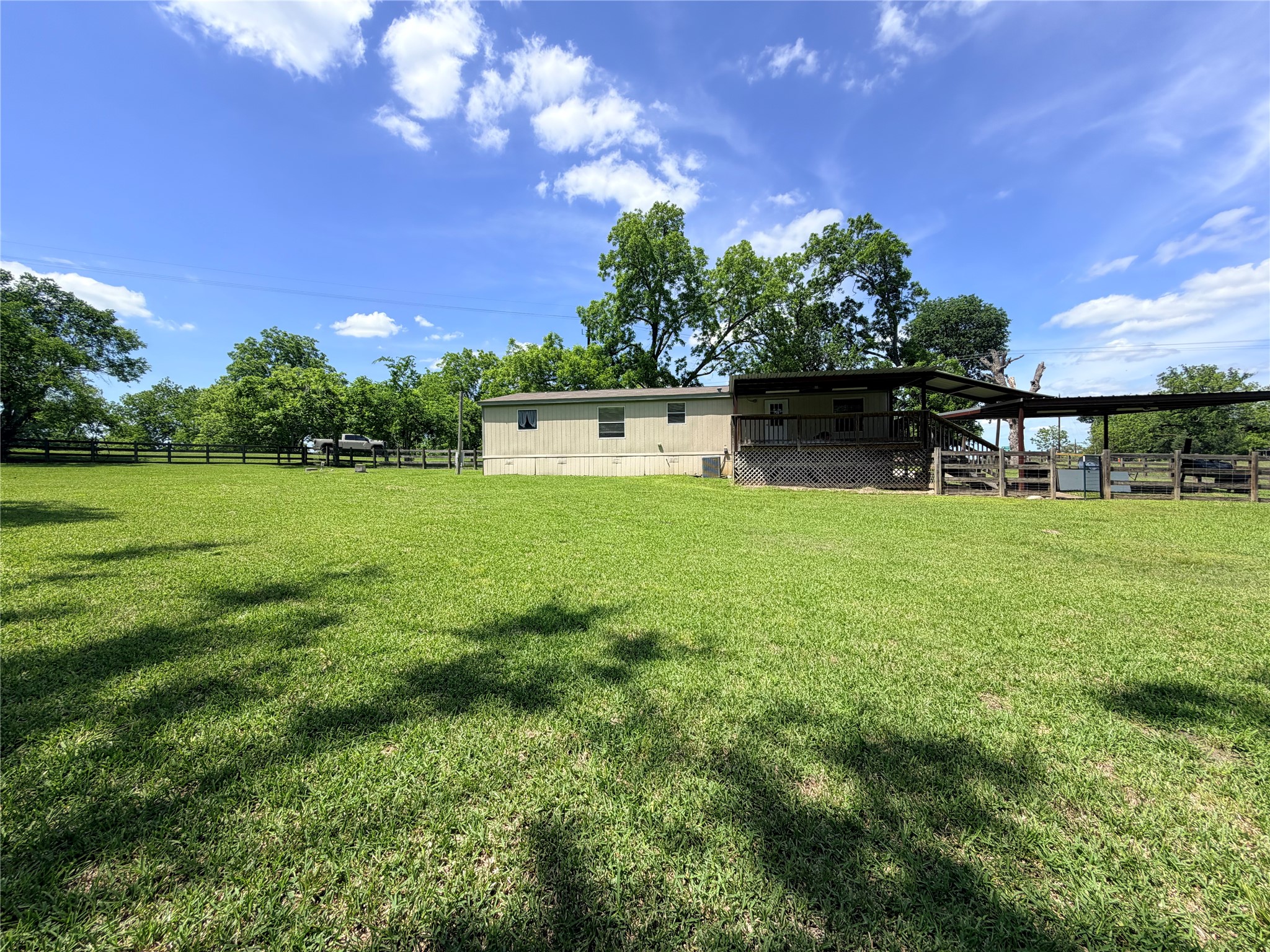 263 Camden Road Chester, TX 75936 - Photo 31 of 49 a view of a lake with a yard