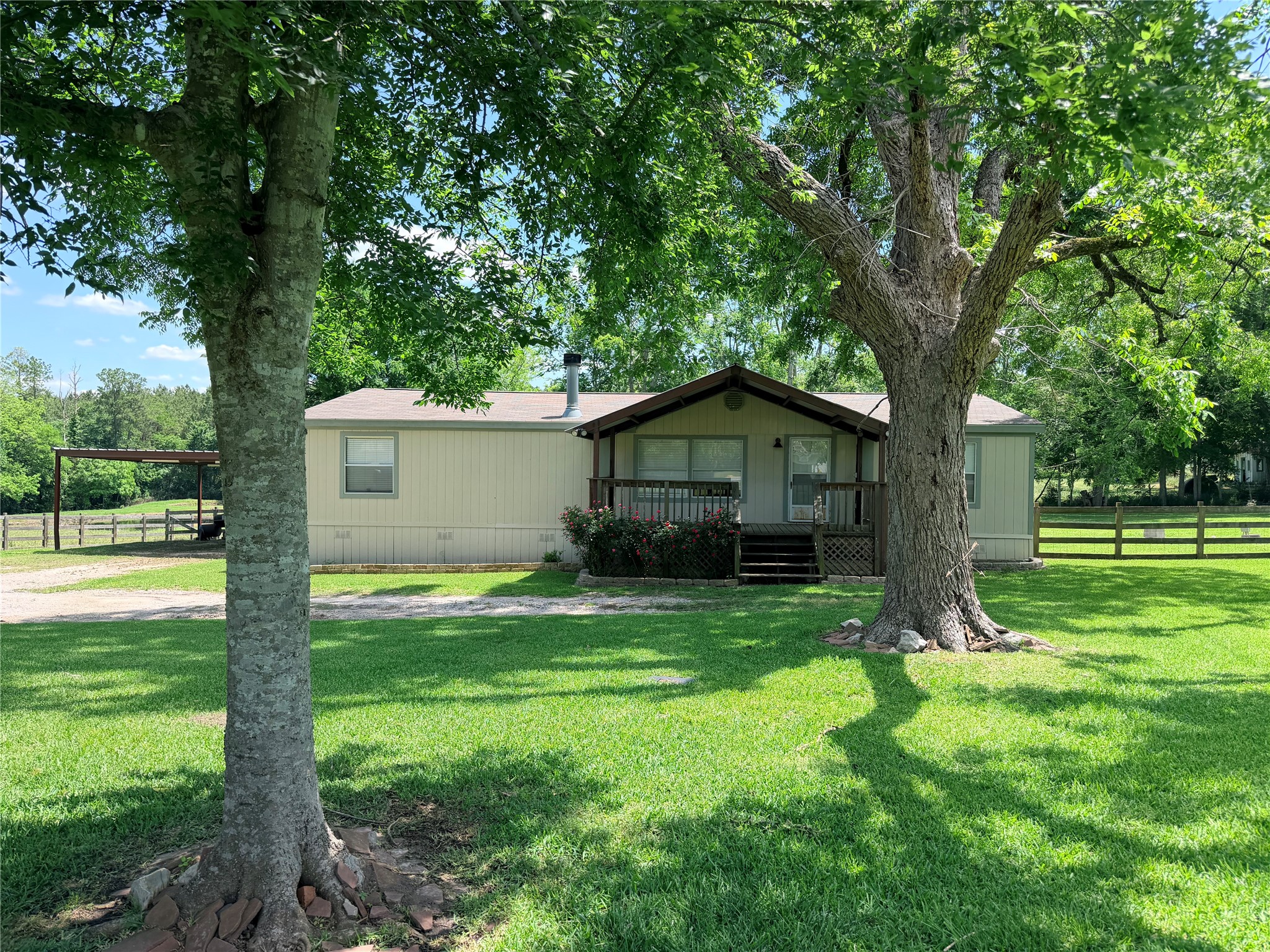 263 Camden Road Chester, TX 75936 - Photo 4 of 49 a front view of house with yard and green space