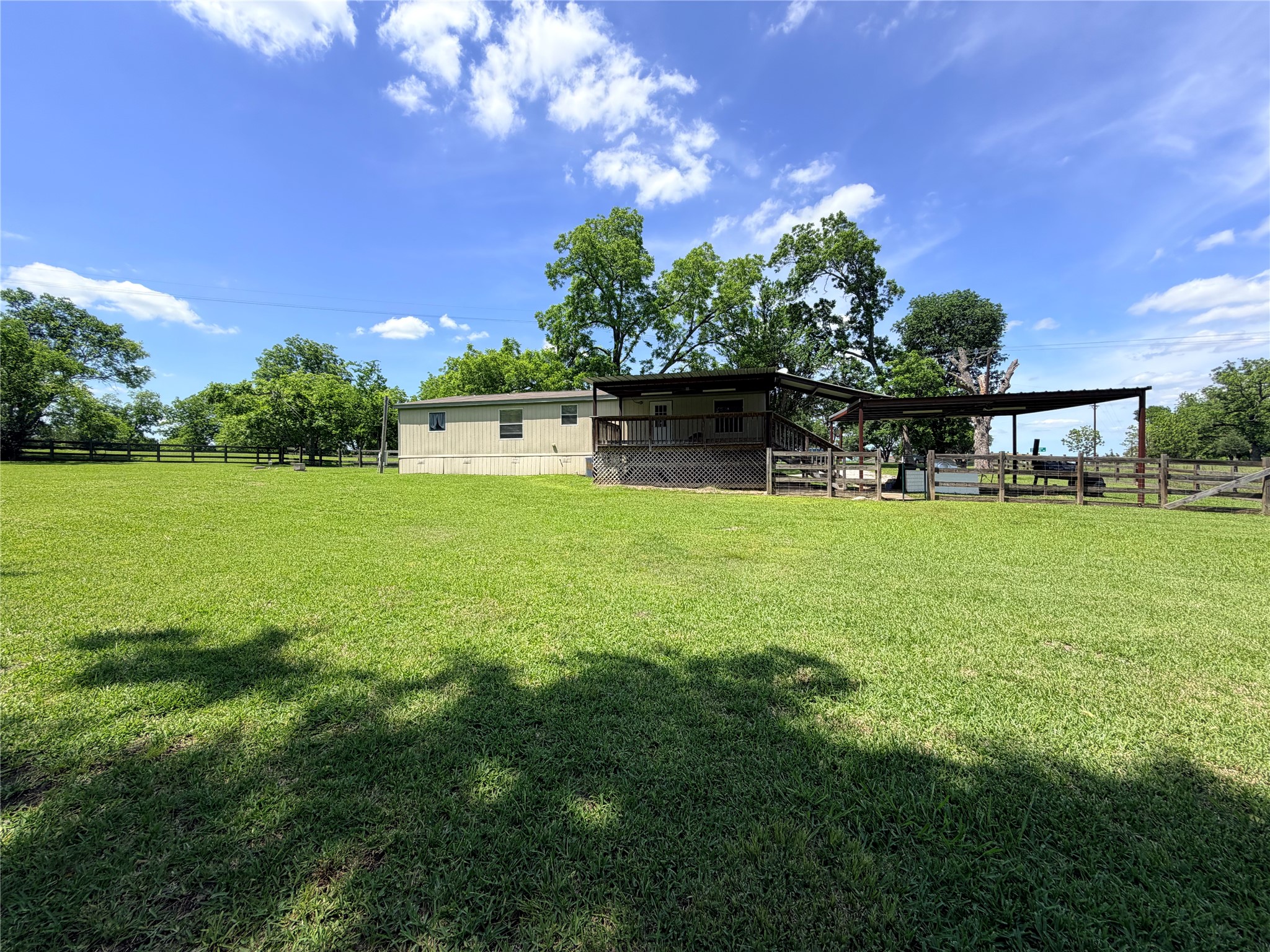 263 Camden Road Chester, TX 75936 - Photo 43 of 49 a view of a house with a swimming pool