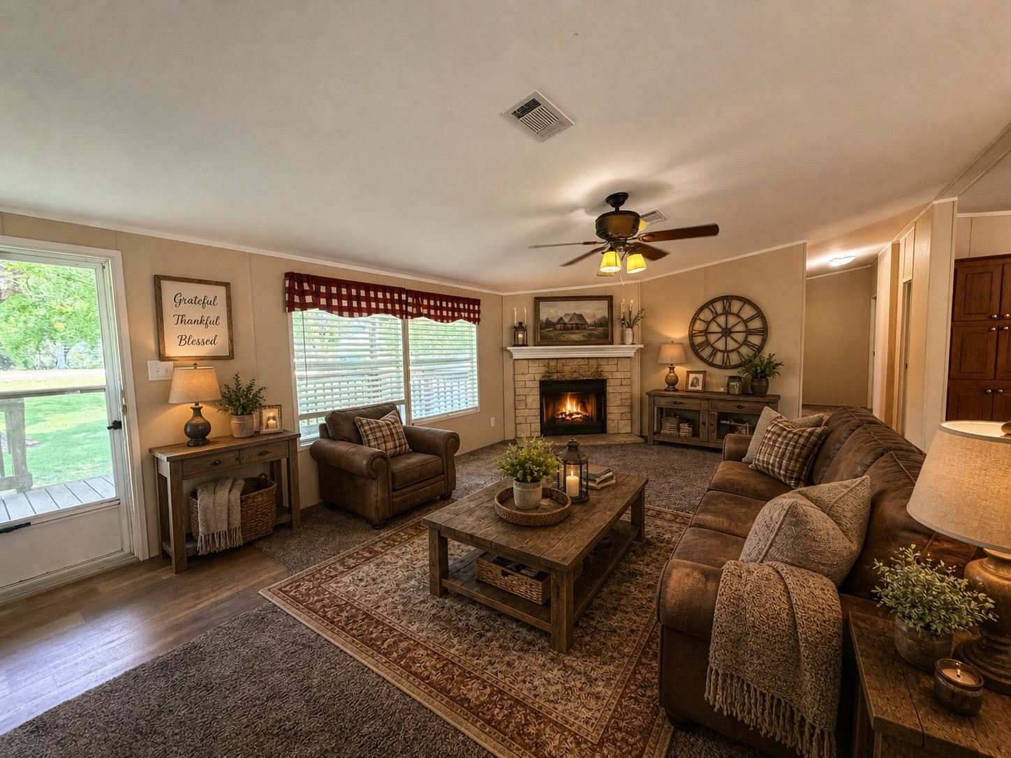 263 Camden Road Chester, TX 75936 - Photo 10 of 49 a living room with furniture a fireplace and a large window