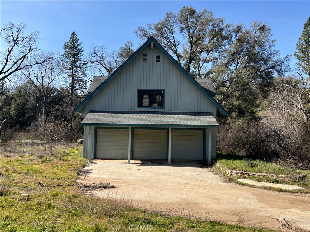 a house with trees in the background