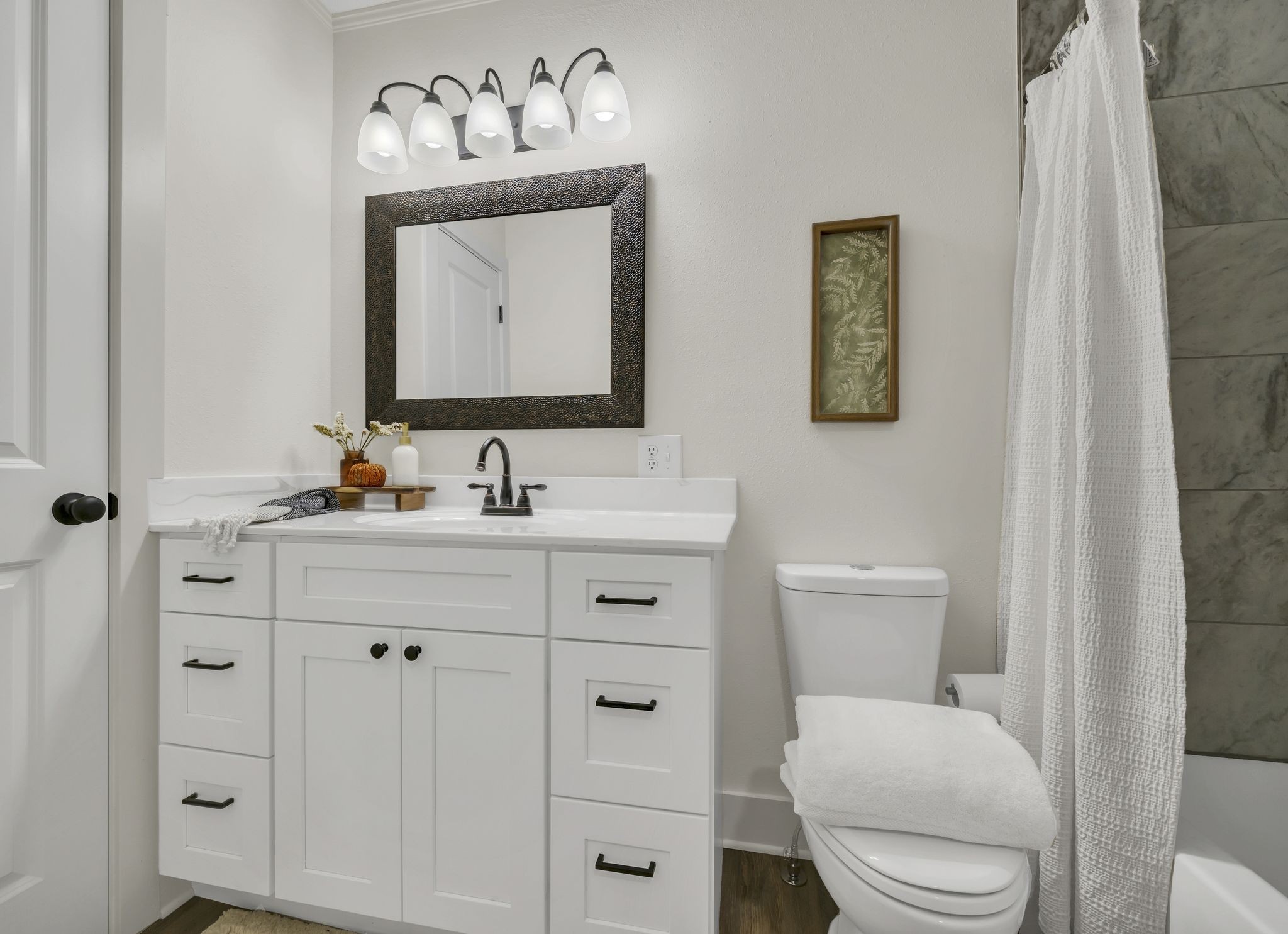 100 Brook Drive Dickson, TN 37055 - Photo 14 of 23 a bathroom with a toilet sink vanity and mirror