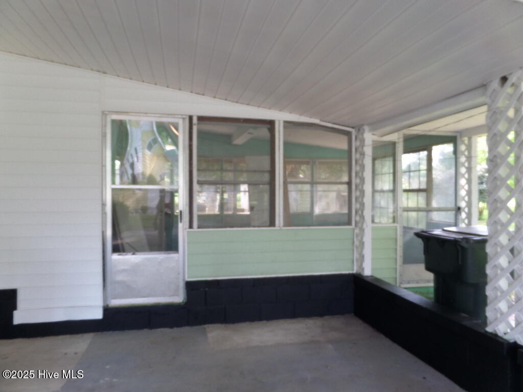 108 Swan Point Road Bayboro, NC 28515 - Photo 43 of 44 Screen Porch Area