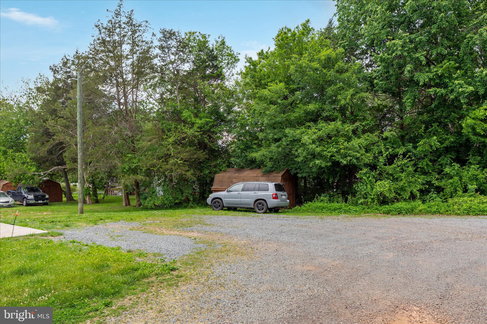 208 North Rappahannock Street Remington, VA 22734 - Photo 19 of 21 a view of a house with a yard and sitting area