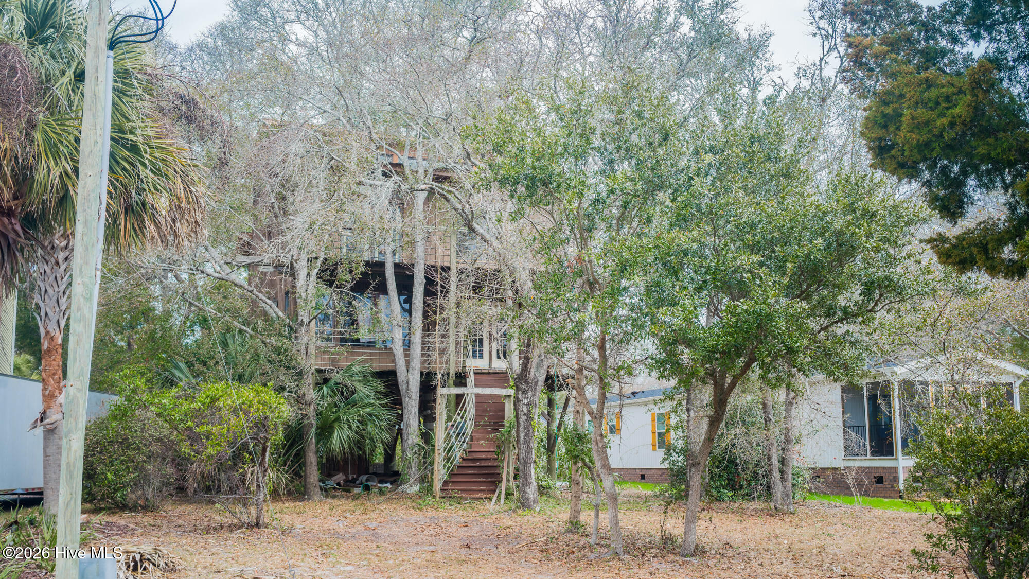 1148 Indigo Circle Sunset Beach, NC 28468 - Photo 1 of 42 Existing front