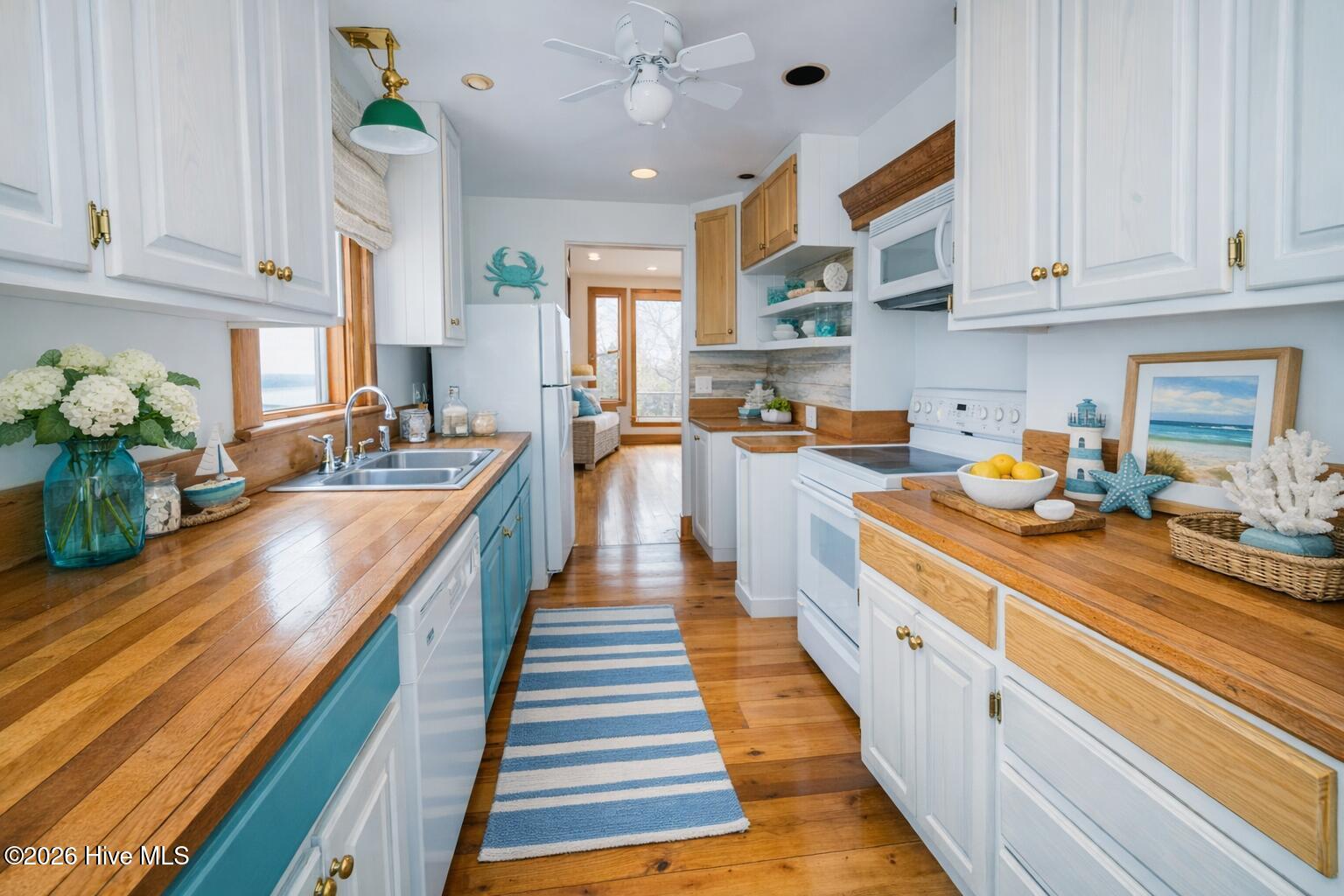 1148 Indigo Circle Sunset Beach, NC 28468 - Photo 14 of 42 Kitchen with the help of AI