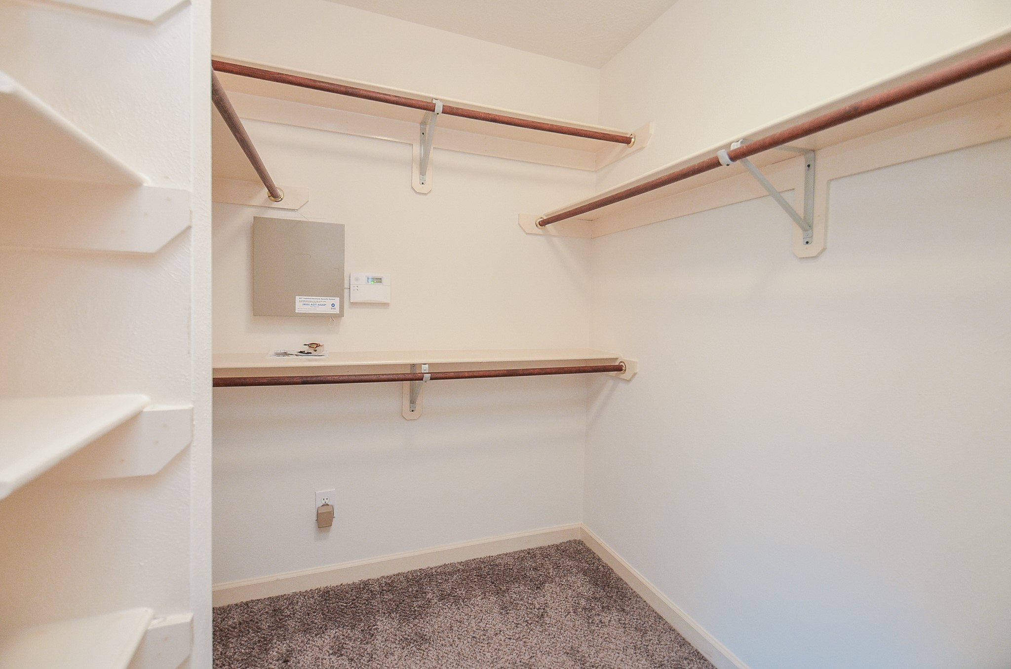 811 Spring Valley Court Sugar Land, TX 77479 - Photo 15 of 33 a view of an empty walk in closet