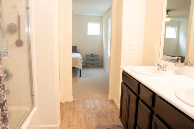 a view of an empty room and a window