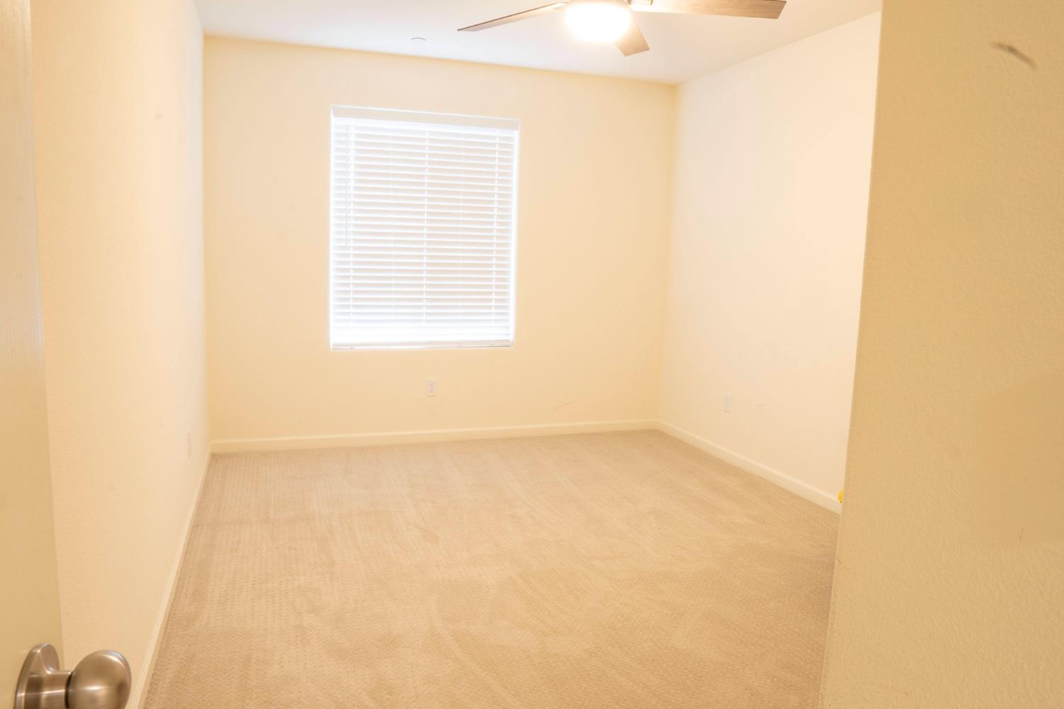 6974 East Atchison Street Fresno, CA 93727 - Photo 25 of 40 a view of a small space with a window