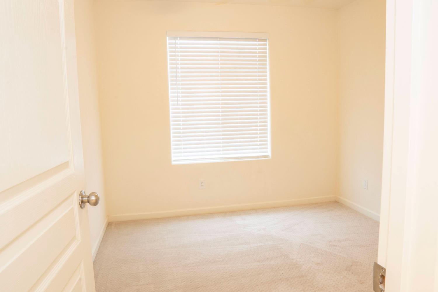 6974 East Atchison Street Fresno, CA 93727 - Photo 31 of 40 a view of an empty room with a window