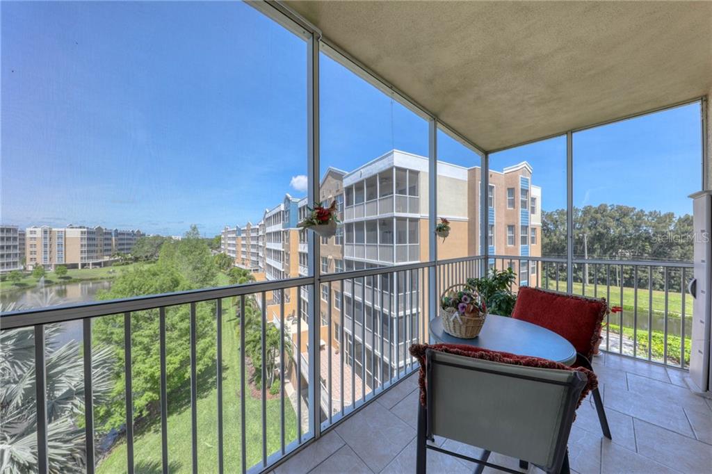 a view of balcony with furniture