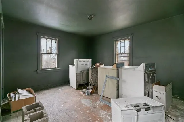 a utility room with dryer and washer