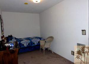 24640 Fern Valley Road Idyllwild, CA 92549 - Photo 14 of 18 a room with furniture and a table