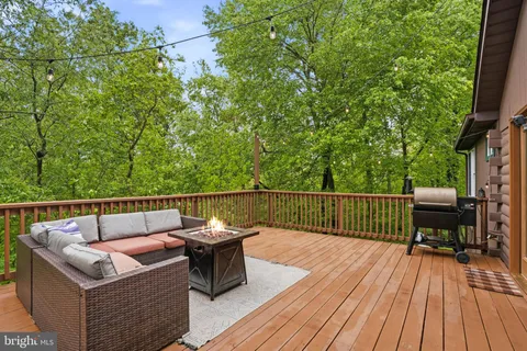 a view of a balcony with furniture