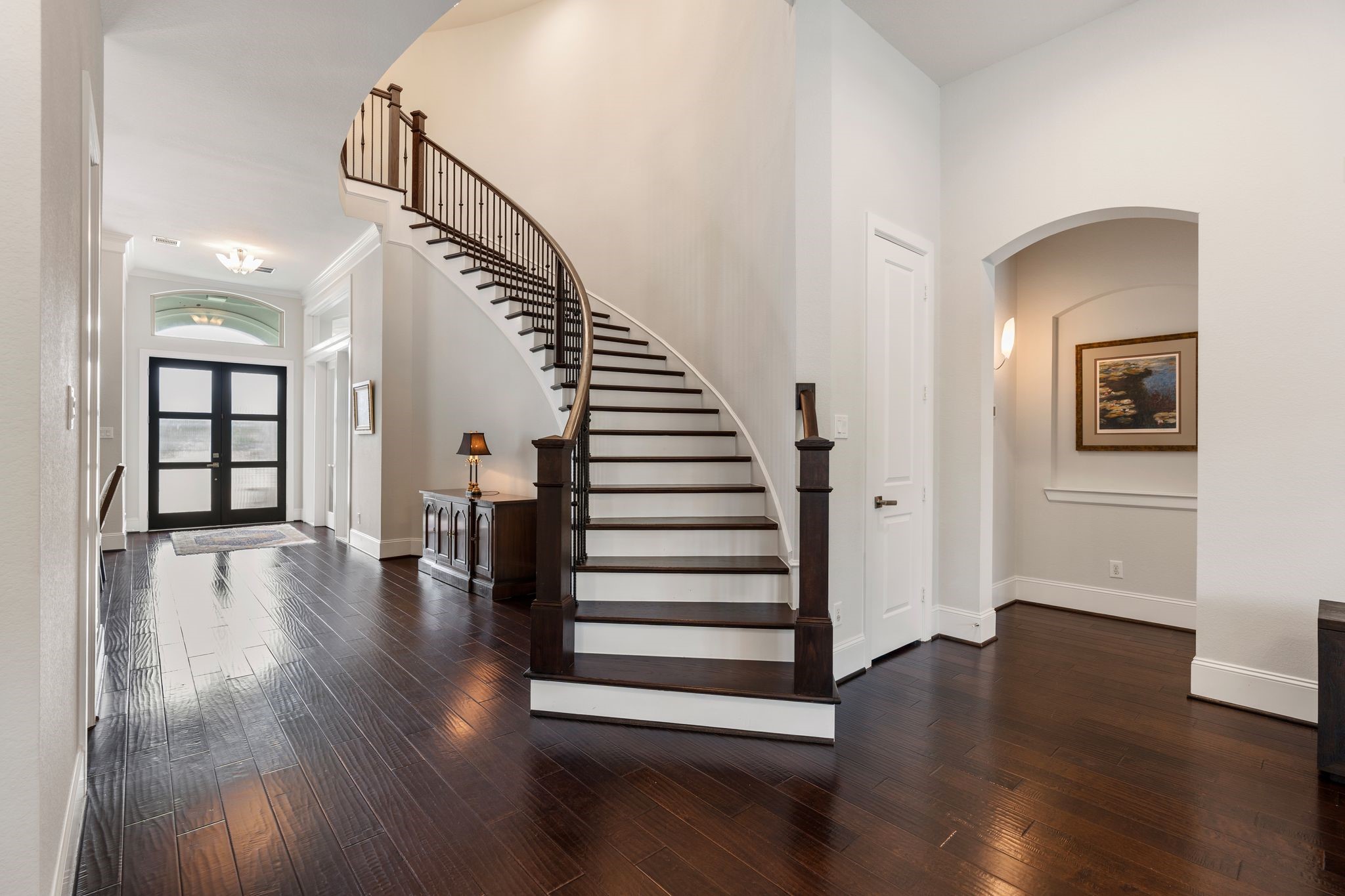 2926 Fairmont Ridge Lane Katy, TX 77494 - Photo 14 of 49 a view of a room with wooden floor and stairs