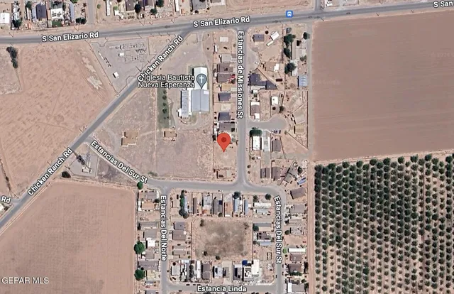 a bathroom with a white sink and a shower curtain