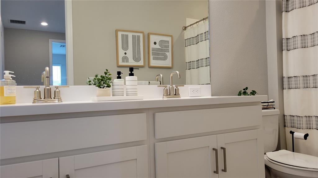 5419 Summit Glen Bradenton, FL 34203 - Photo 24 of 38 a bathroom with a sink and a toilet