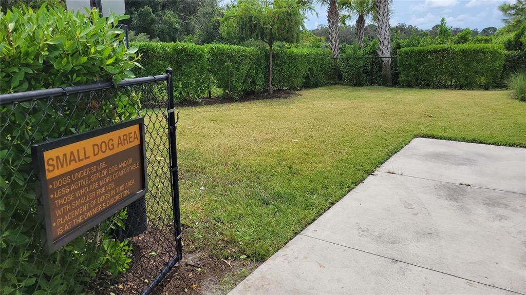 5419 Summit Glen Bradenton, FL 34203 - Photo 34 of 38 a view of a park with a bench and trees