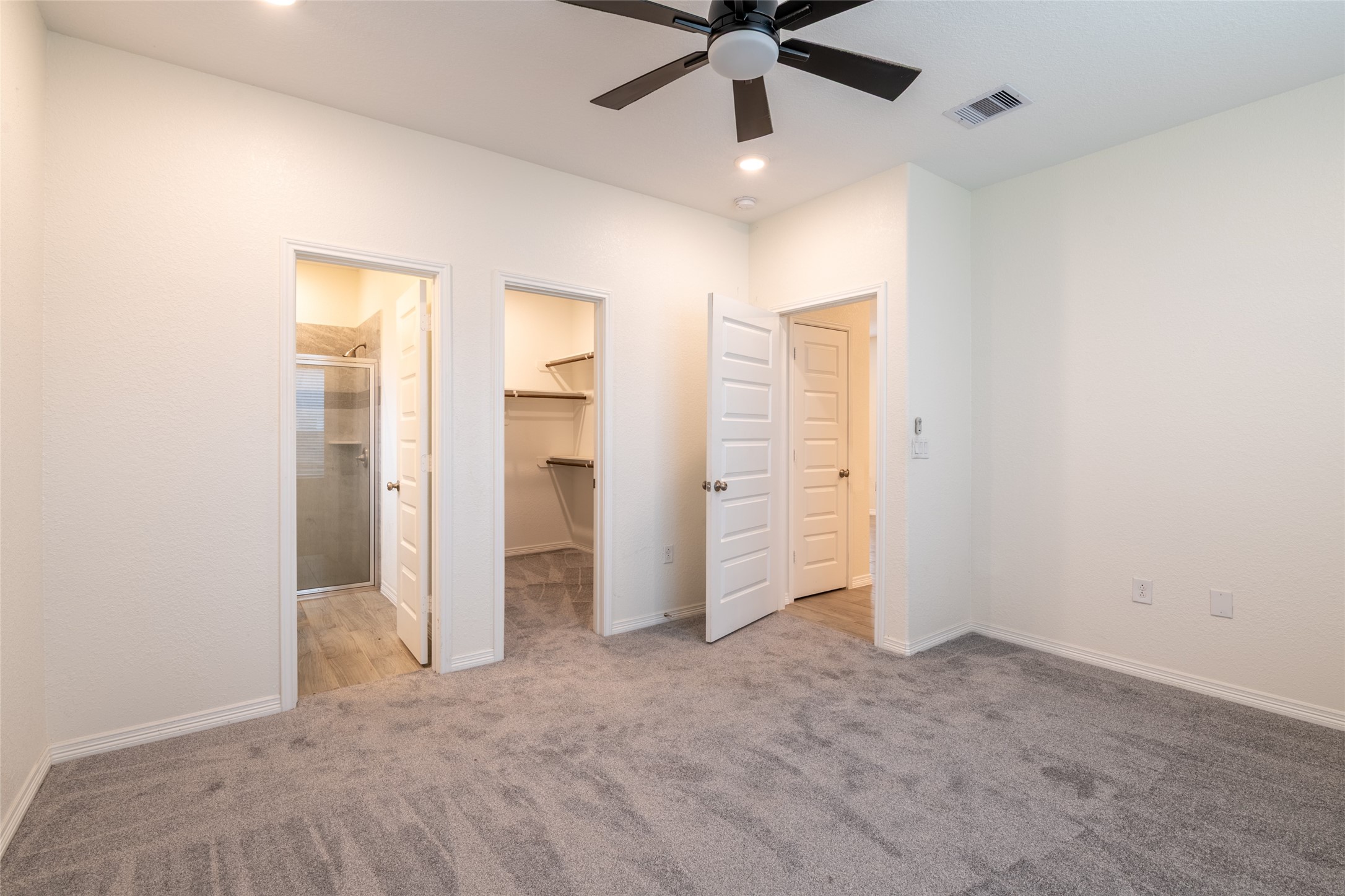 25012 Armagh Road Hempstead, TX 77445 - Photo 16 of 33 an empty room with closet and a ceiling fan