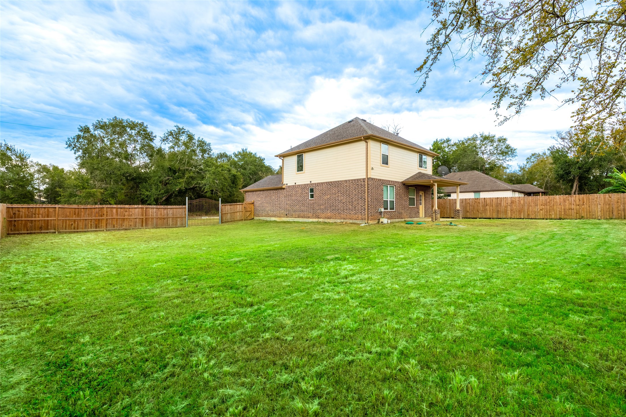 25012 Armagh Road Hempstead, TX 77445 - Photo 31 of 33 a front view of a house with garden