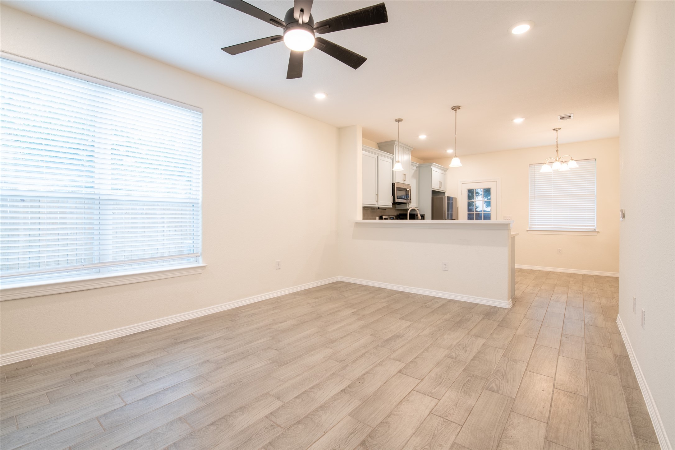 25012 Armagh Road Hempstead, TX 77445 - Photo 8 of 33 a view of a kitchen with a sink and wooden floor
