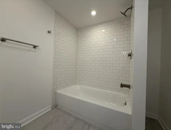 a bathroom with a bathtub