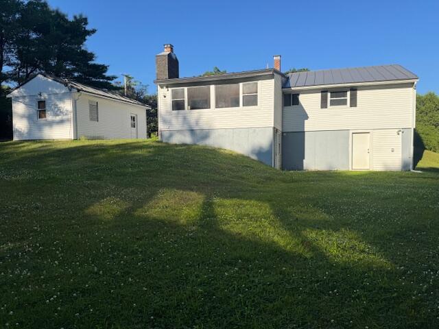 787 Wiscasset Road Pittston, ME 04345 - Photo 22 of 25 #19- Back of home- Bonus room has separa