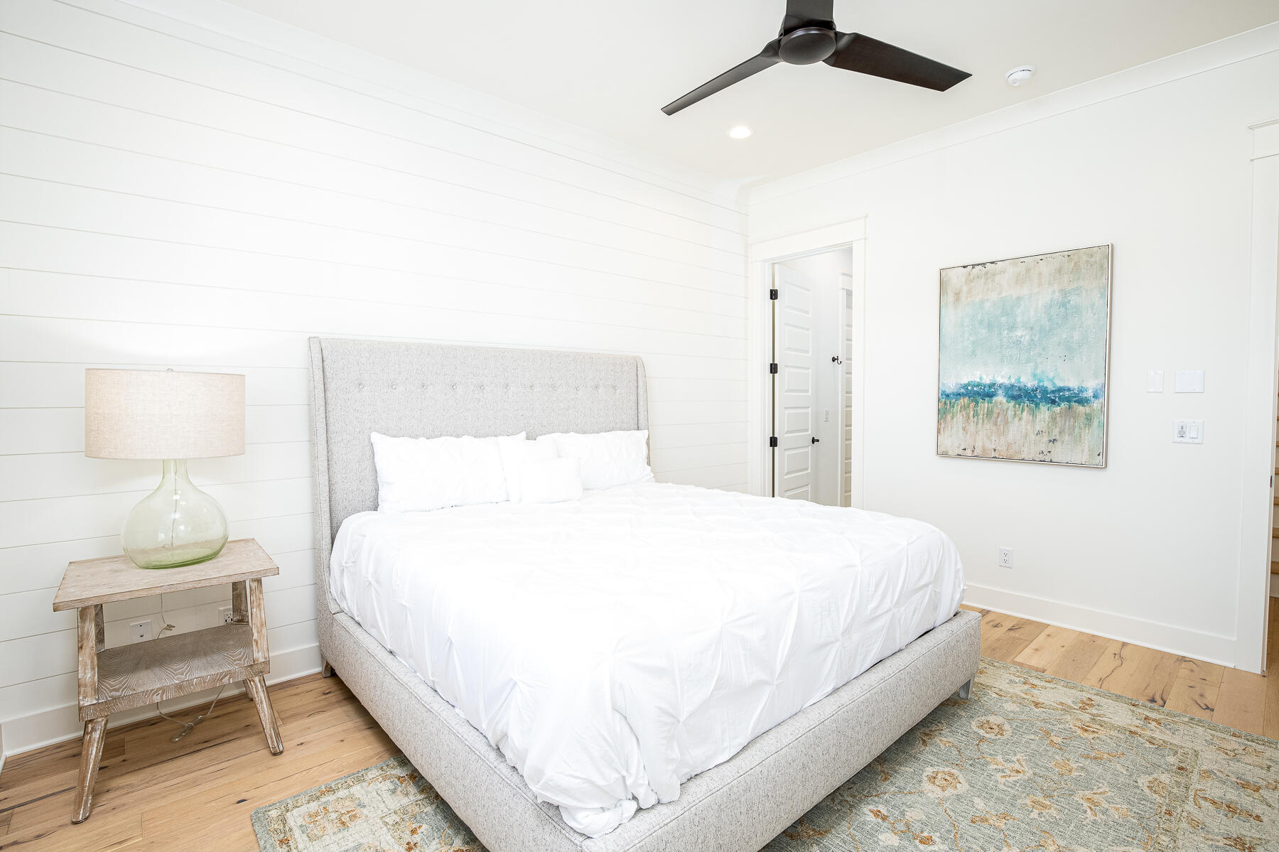 299 Ridgewalk Circle Santa Rosa Beach, FL 32459 - Photo 19 of 46 a bedroom with a bed and lamp