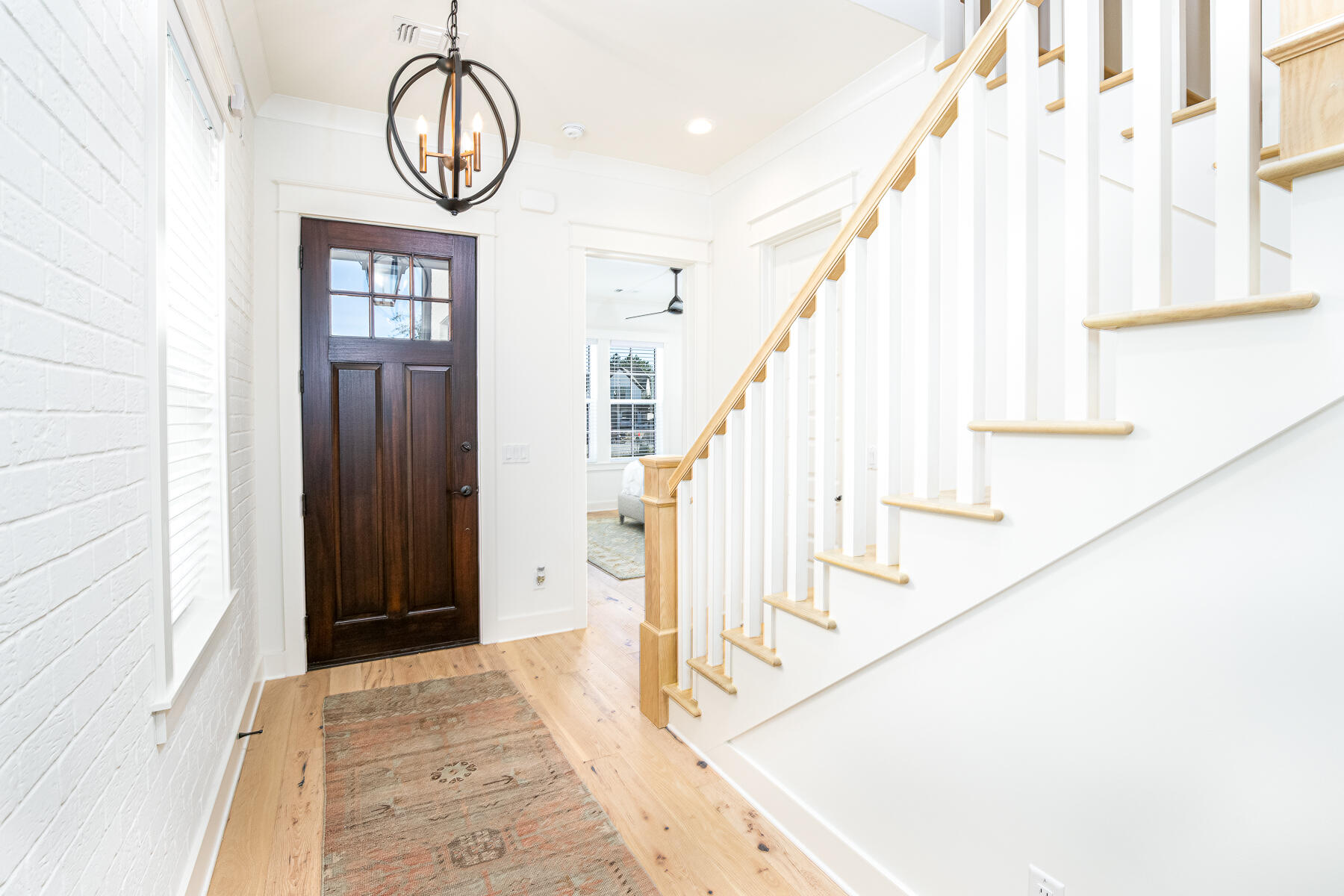 299 Ridgewalk Circle Santa Rosa Beach, FL 32459 - Photo 5 of 46 a view of entryway with wooden floor and door