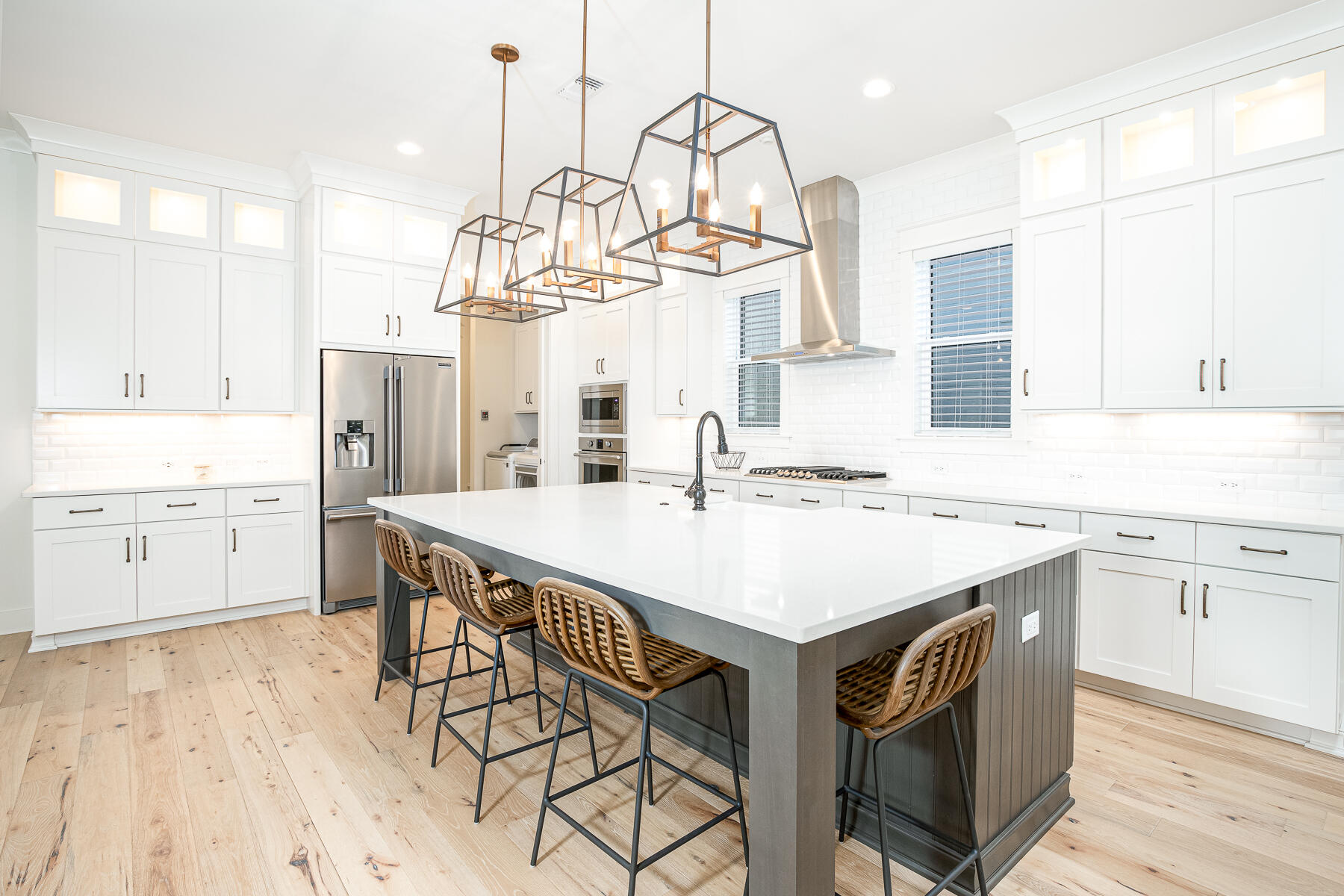 299 Ridgewalk Circle Santa Rosa Beach, FL 32459 - Photo 10 of 46 a kitchen with a sink a cabinets and wooden floor