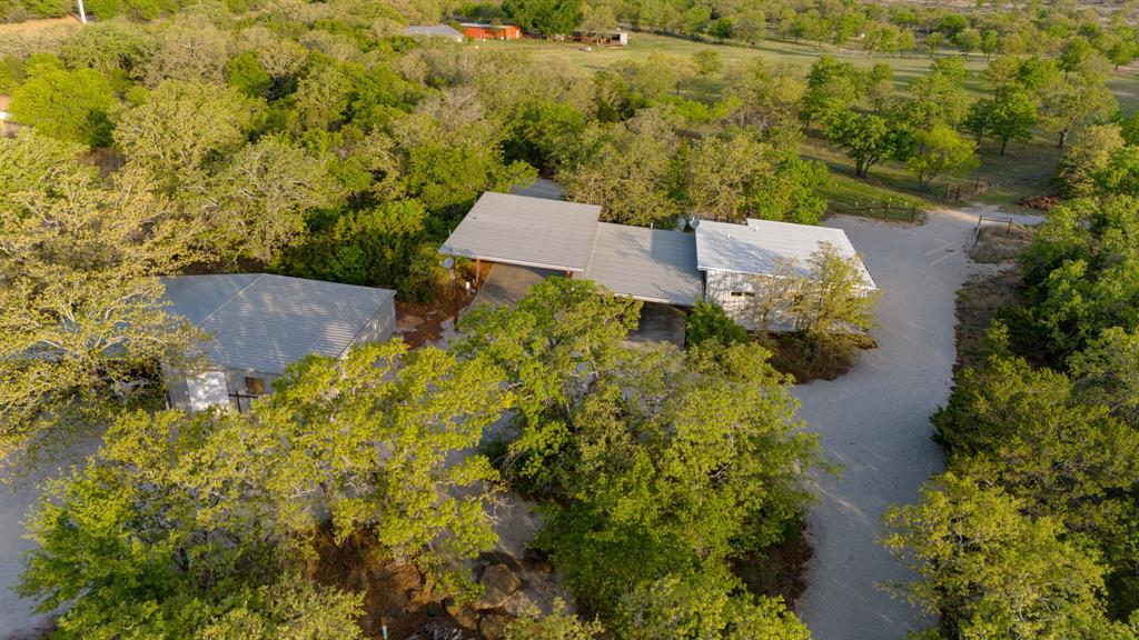 3257 Finis Road Graham, TX 76450 - Photo 12 of 40 an aerial view of a house with a yard and lake view