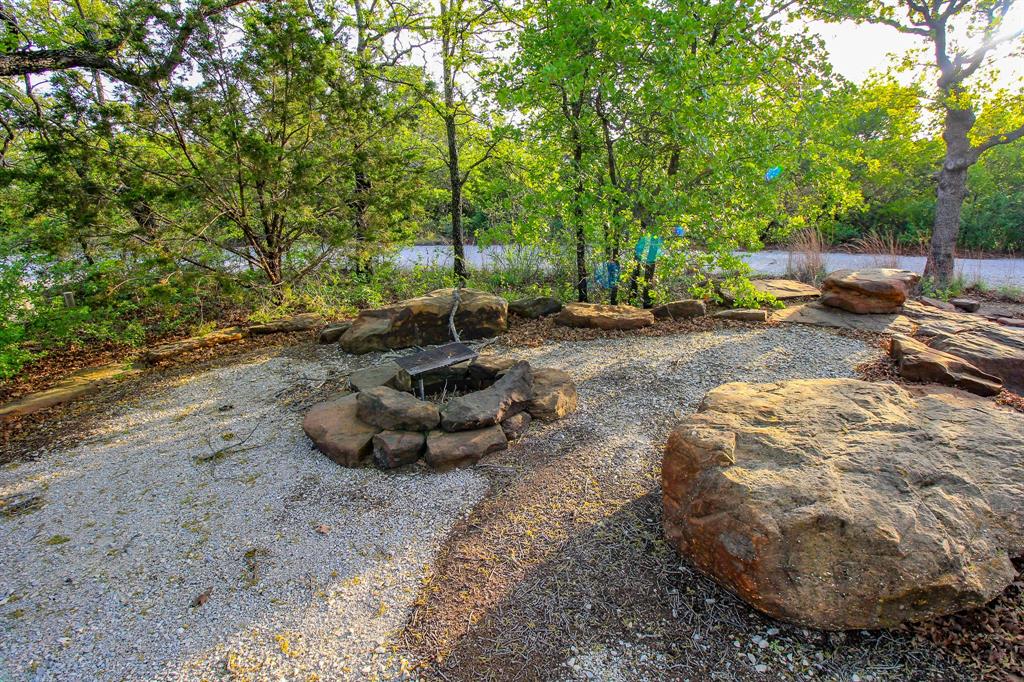 3257 Finis Road Graham, TX 76450 - Photo 24 of 40 a view of a backyard with swimming pool