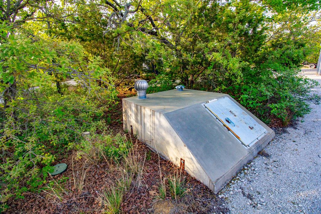 3257 Finis Road Graham, TX 76450 - Photo 28 of 40 a view of a yard in a backyard