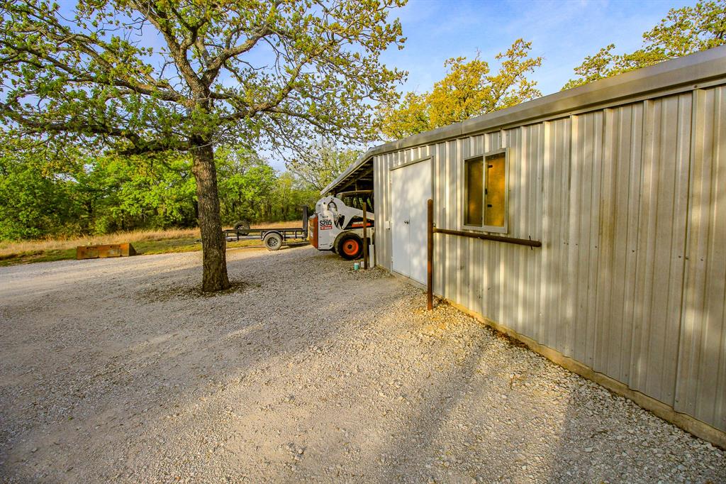 3257 Finis Road Graham, TX 76450 - Photo 31 of 40 a view of a back yard of the house