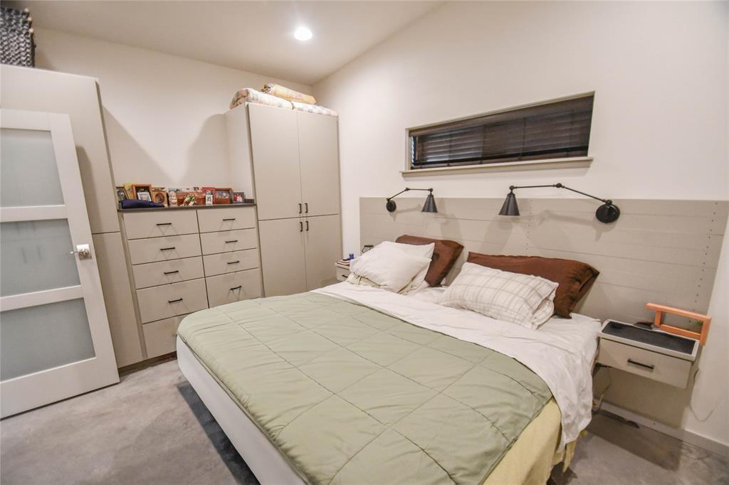 3257 Finis Road Graham, TX 76450 - Photo 37 of 40 a bedroom with a bed and flat screen tv