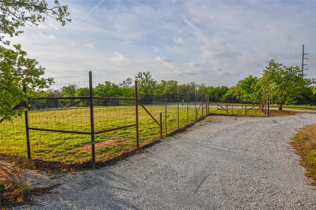 3257 Finis Road Graham, TX 76450 - Photo 40 of 40 a view of a lake with a yard