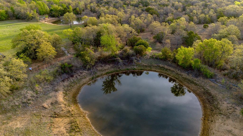 3257 Finis Road Graham, TX 76450 - Photo 7 of 40 a view of a lake with outdoor space
