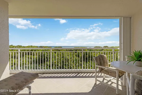 a view of a balcony with lake view