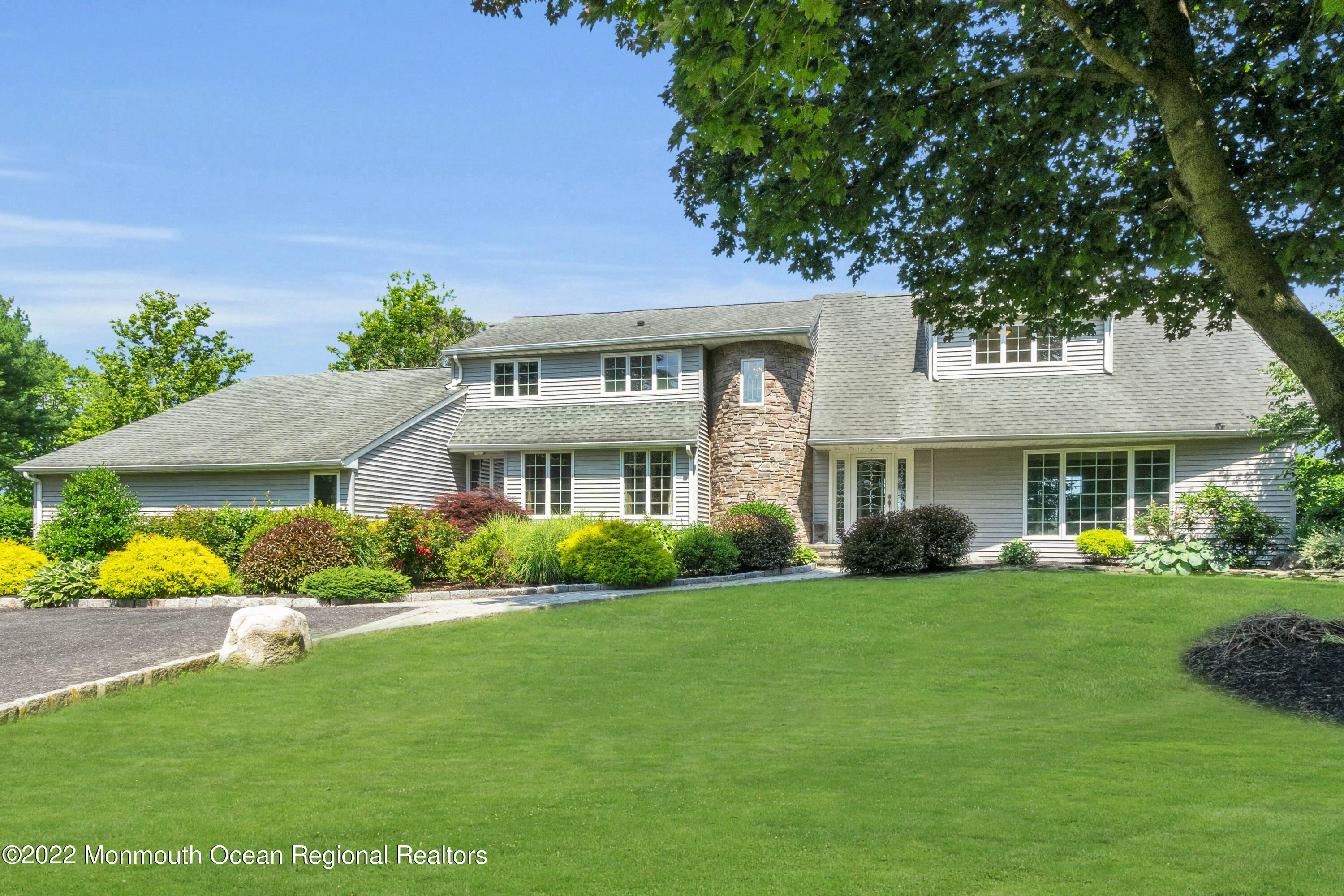 63 Red Valley Road Cream Ridge, NJ 08514 - Photo 8 of 48 a front view of a house with garden and porch