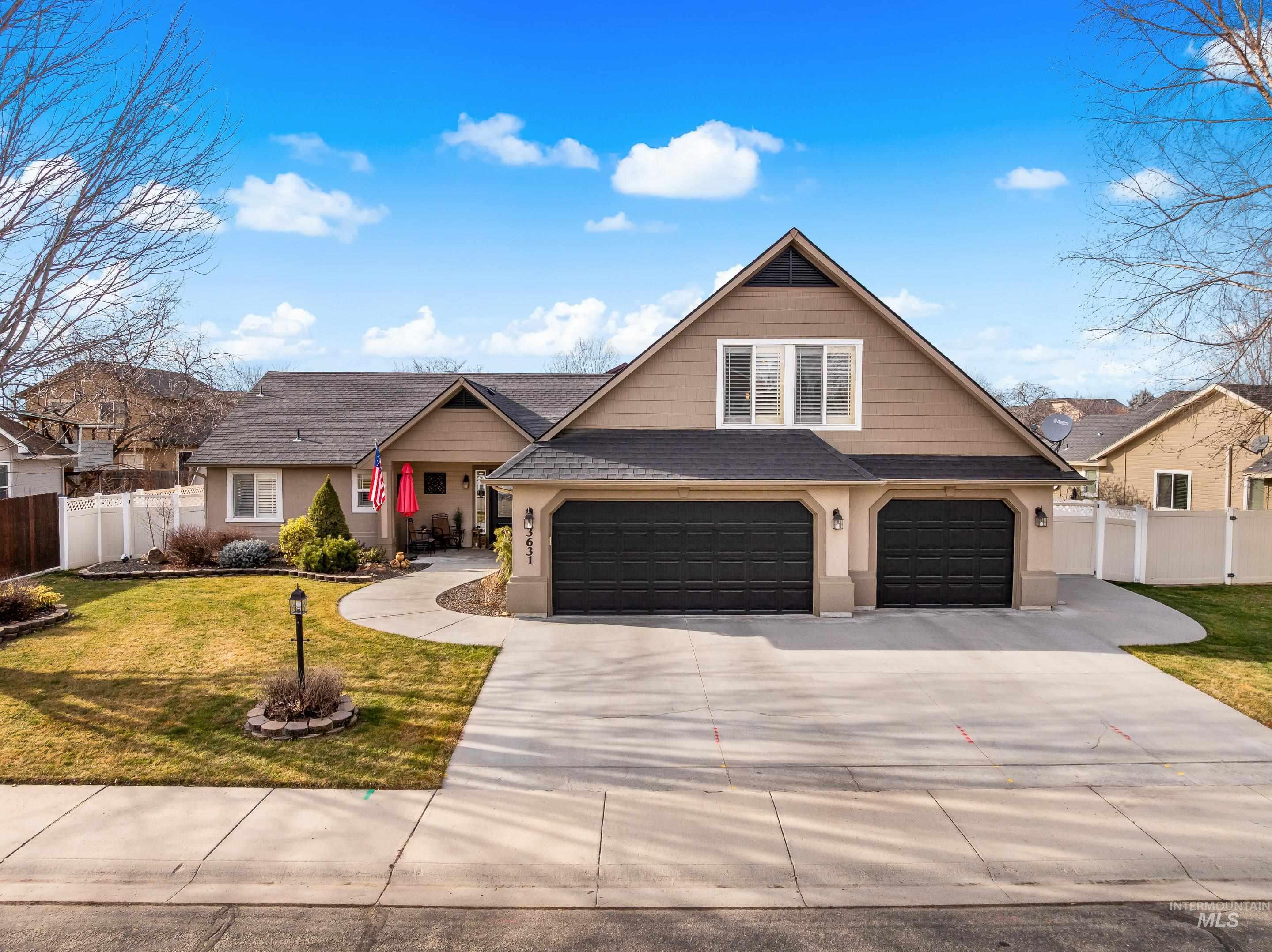 3631 North Alexis Way Meridian, ID 83646 - Photo 2 of 49 Craftsman house with concrete driveway, a garage, roof with shingles, stucco siding, and a porch