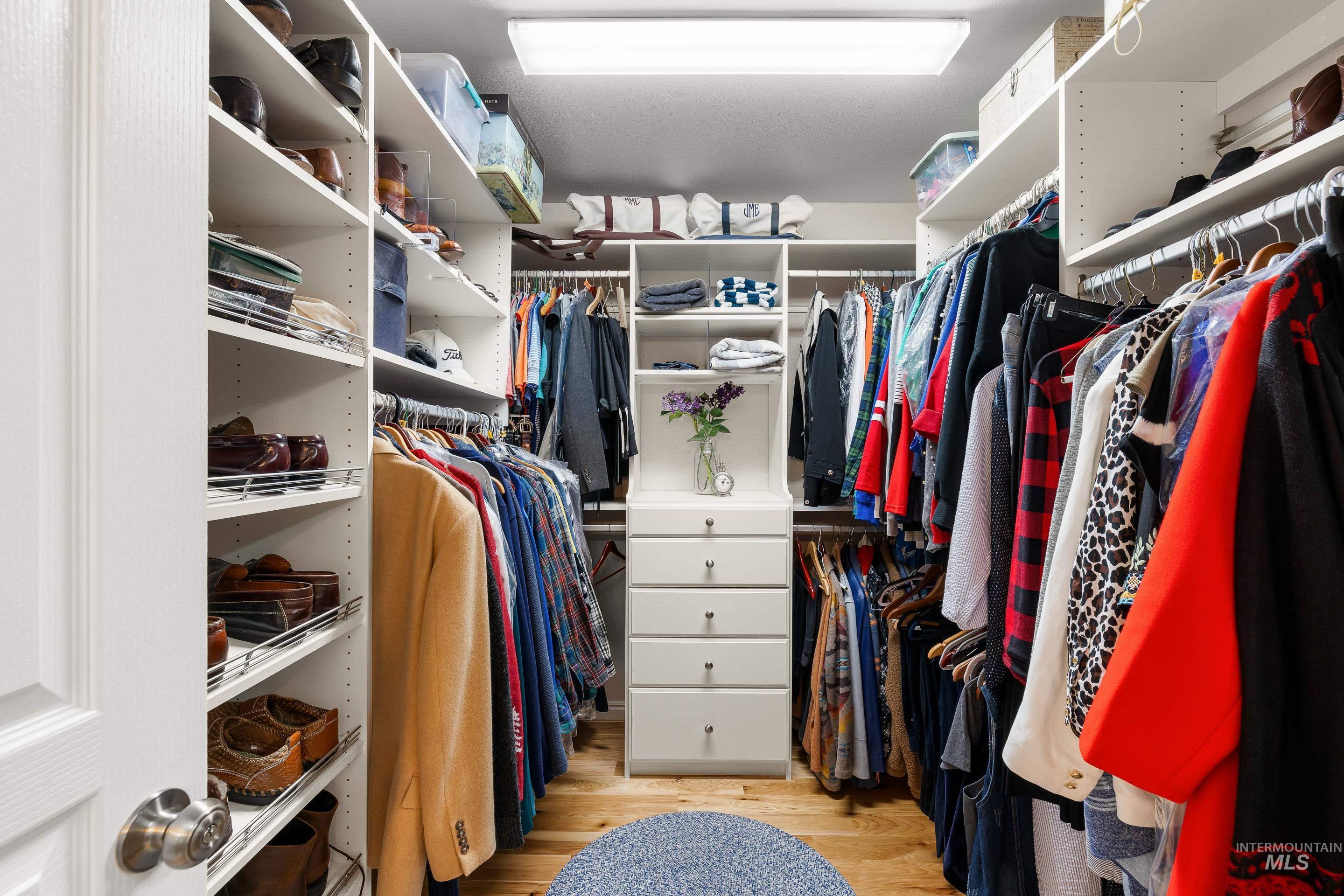 3631 North Alexis Way Meridian, ID 83646 - Photo 34 of 49 Walk in closet with light wood-style flooring