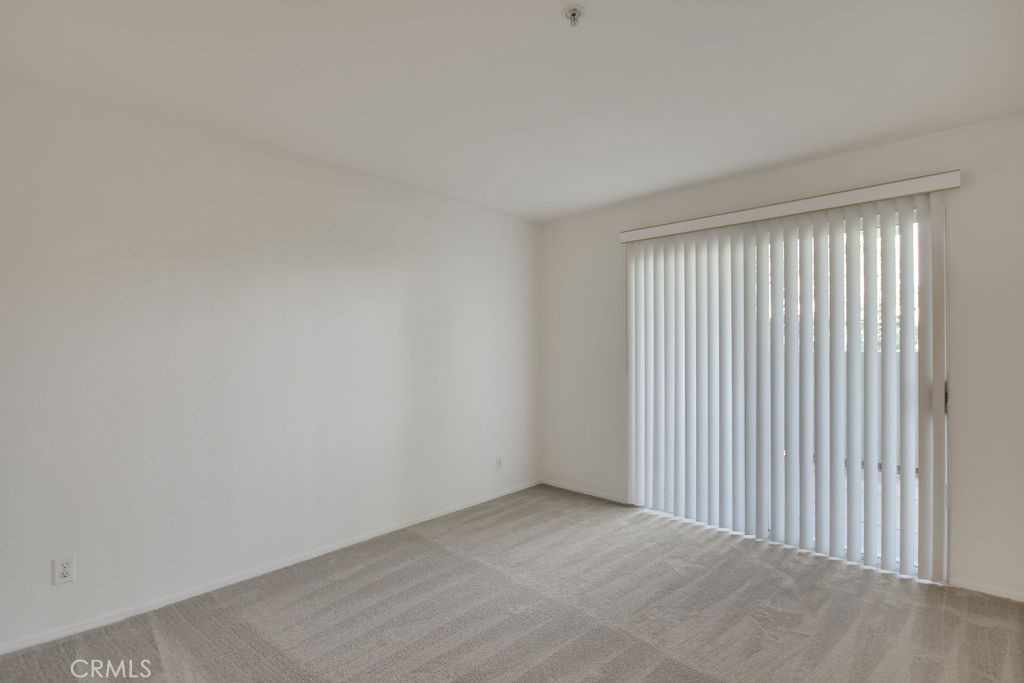 2800 Keller Drive, Unit 282 Tustin, CA 92782 - Photo 11 of 19 a view of an empty room with a window