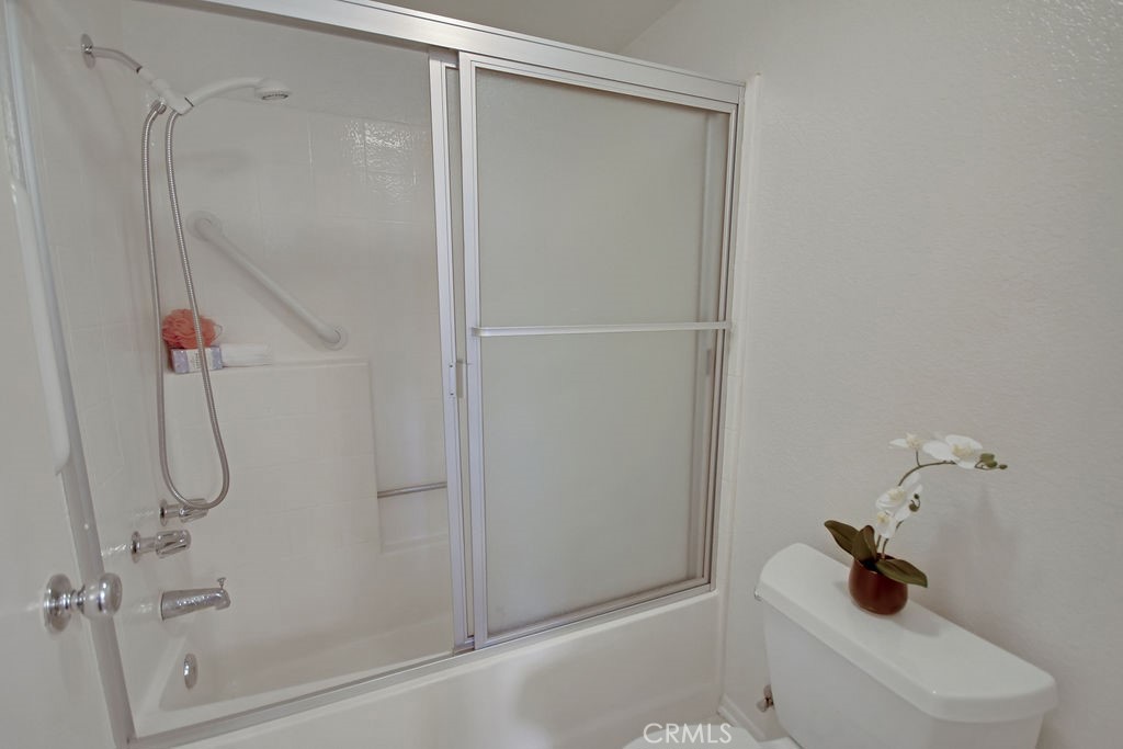2800 Keller Drive, Unit 282 Tustin, CA 92782 - Photo 14 of 19 a bathroom with a shower